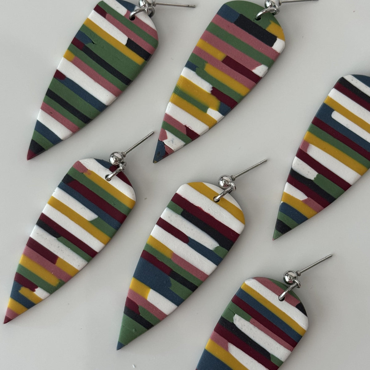 Multicolored dagger polymer clay earrings
