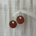 Terracotta round polymer clay earrings on gold hoops