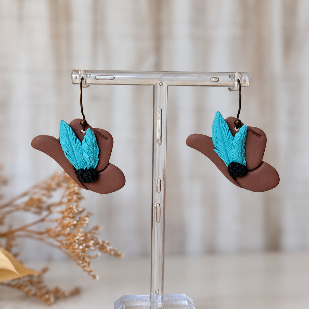Brown teal feathered hat polymer clay earrings